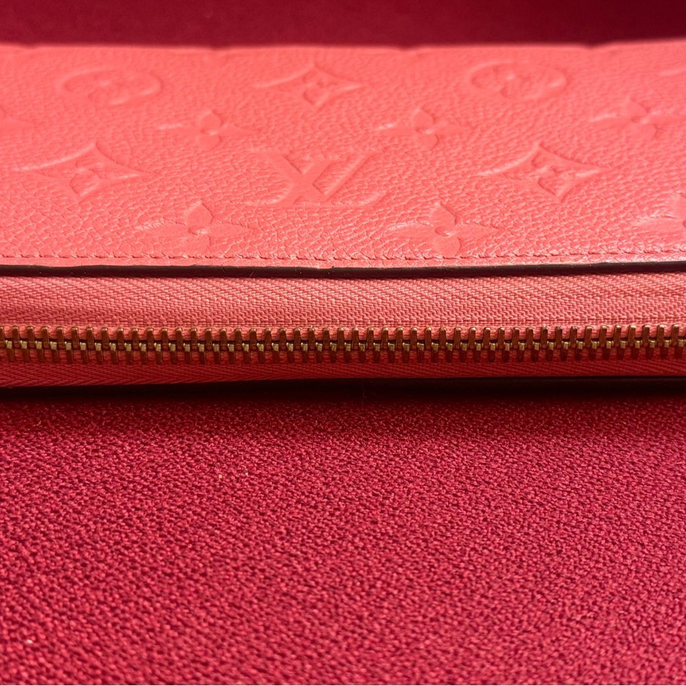 Authenticated Louis Vuitton Pink/Coral Monogram Empreinte Zippy Leather Wallet - Picture 3 of 16